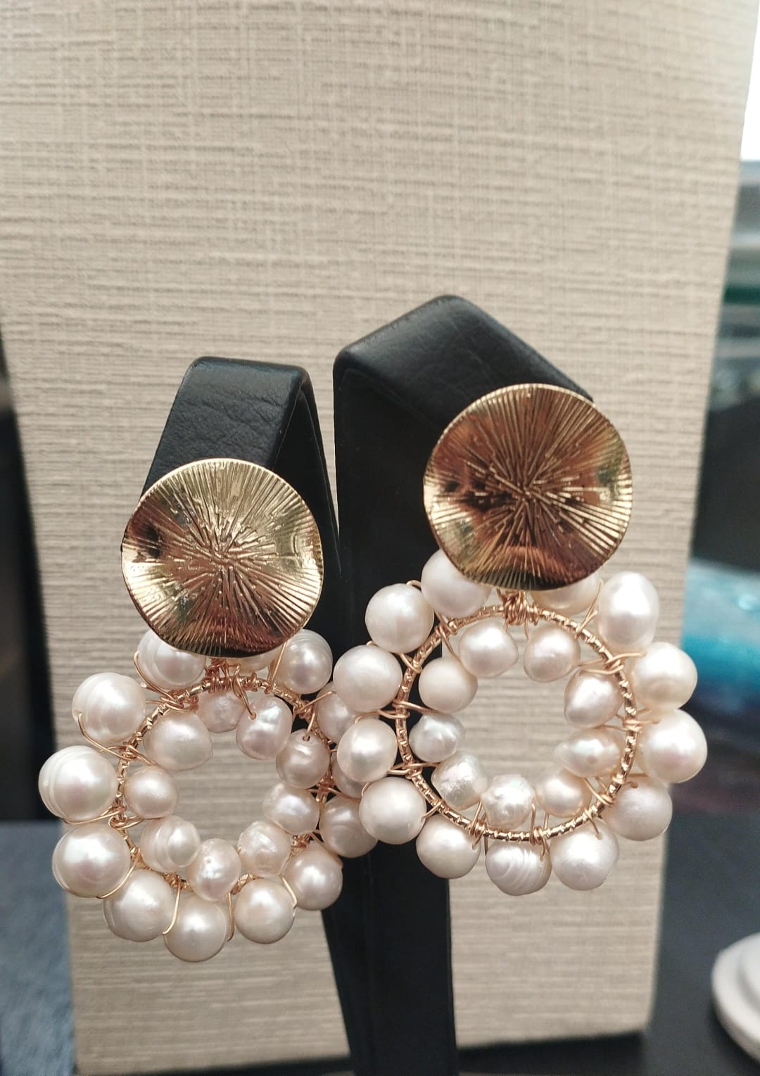 Pearl earrings with gold accents